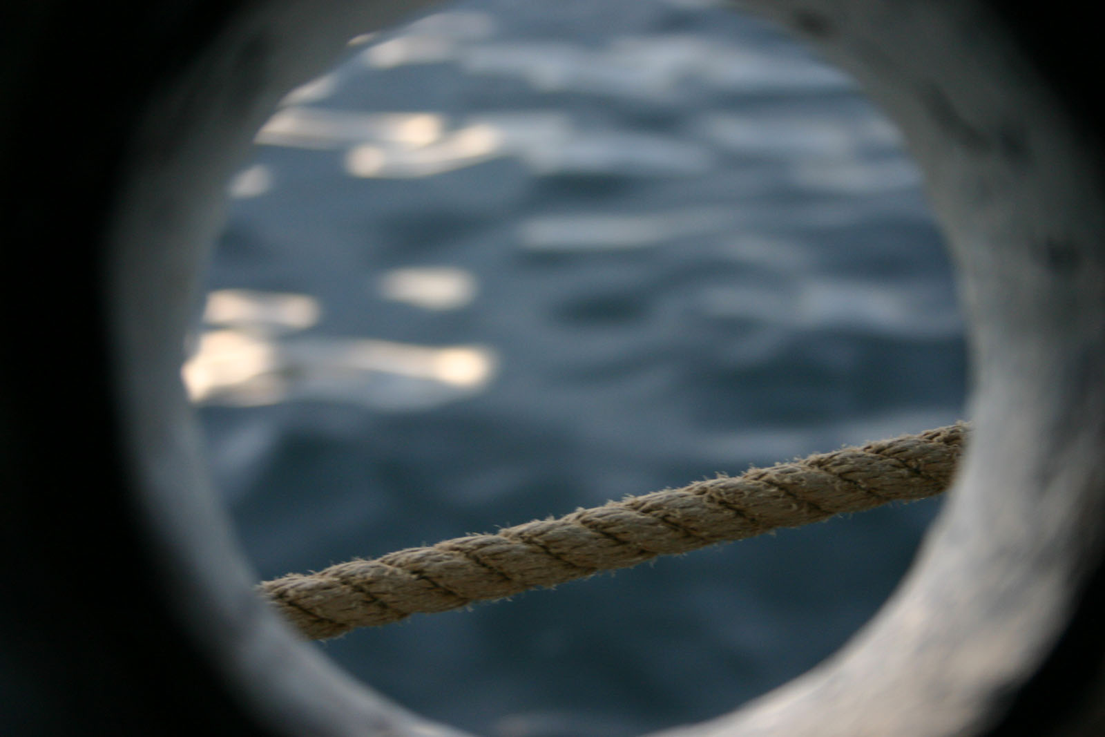 Ropes running across the hull of the ship