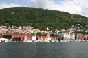 Bryggen, the old wharf quarter and the modern city behind it..